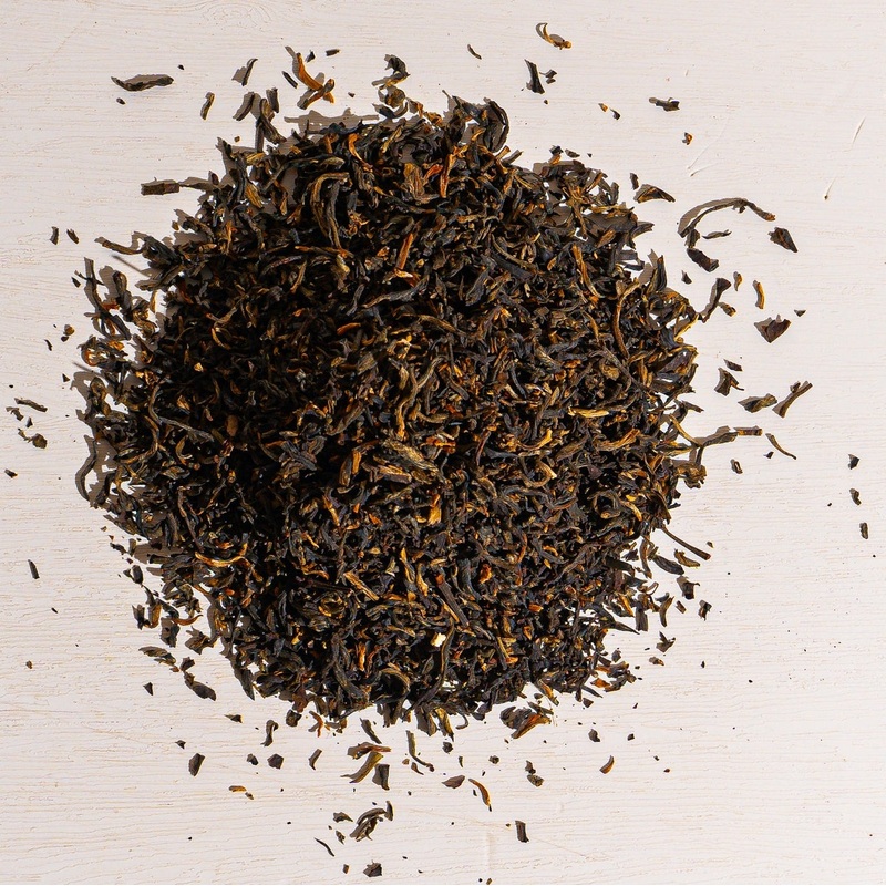 Ying Ming Yunnan Tea|1 oz loose tea sample|4 oz bag of loose tea|4 oz tin of loose tea|8 oz bag of loose tea|16 oz bag of loose tea|4.4 lb (2 kg) bag of loose tea